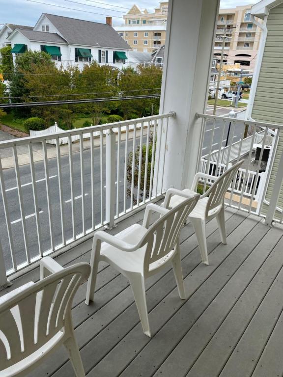 apartment 403 balcony with chairs and street view