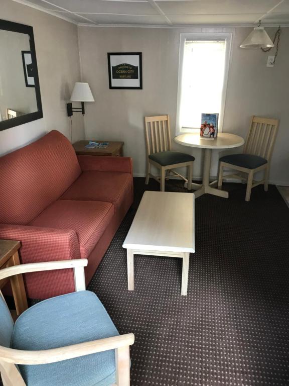 deluxe junior suite with couch table and chairs